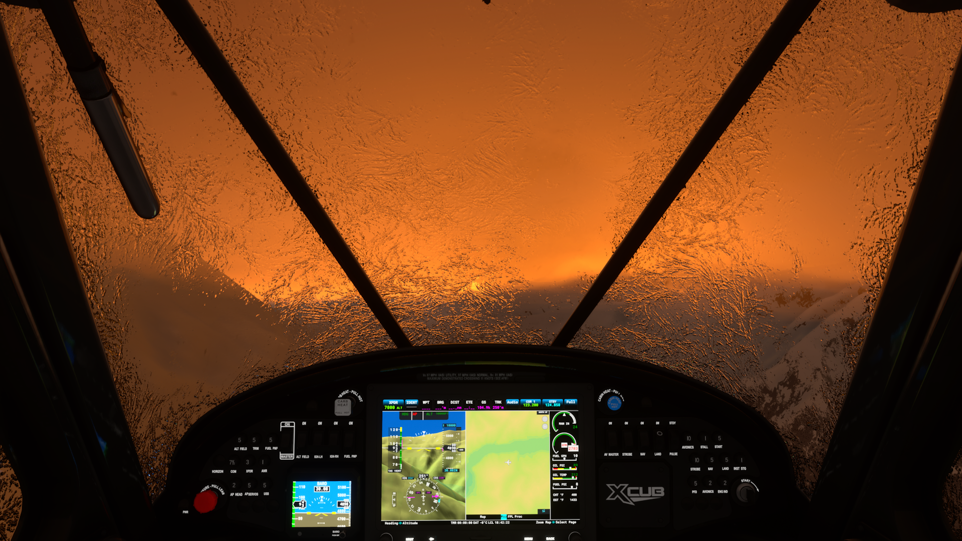 Frozen windshield over the Rockies in Bristish Columbia as the sun is setting on the horizon | Microsoft Flight Simulator